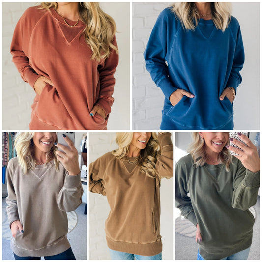 Dámský pulovr s kapsami a žebrovaným vzorem