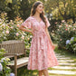 👗🌸 V-neck floral maxi dress with ruffle sleeves and belt