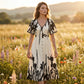 👗 NYNÍ S 40% SLEVOU! 🌿 Midi šaty s výstřihem do V a jemným botanickým potiskem – elegantní, lehké a univerzální pro každou příležitost 🌸