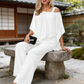 👗✨ Dámská souprava s asymetrickým topem se sifonovým lemem a kalhotami s rozšiřujícími se nohavicemi – 5 barev | M–3XL | Elegantní | Ležérní šik